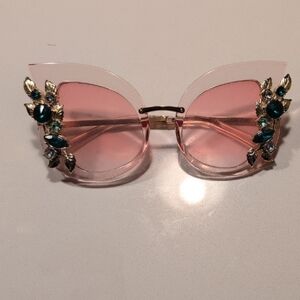 Elegant Pink Sunglasses with Blue Gem Accents